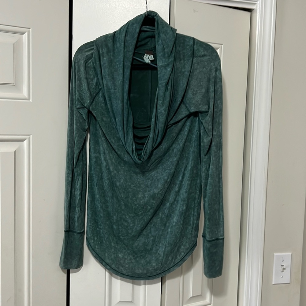 Free people, ultra soft top with thick scoop neck.